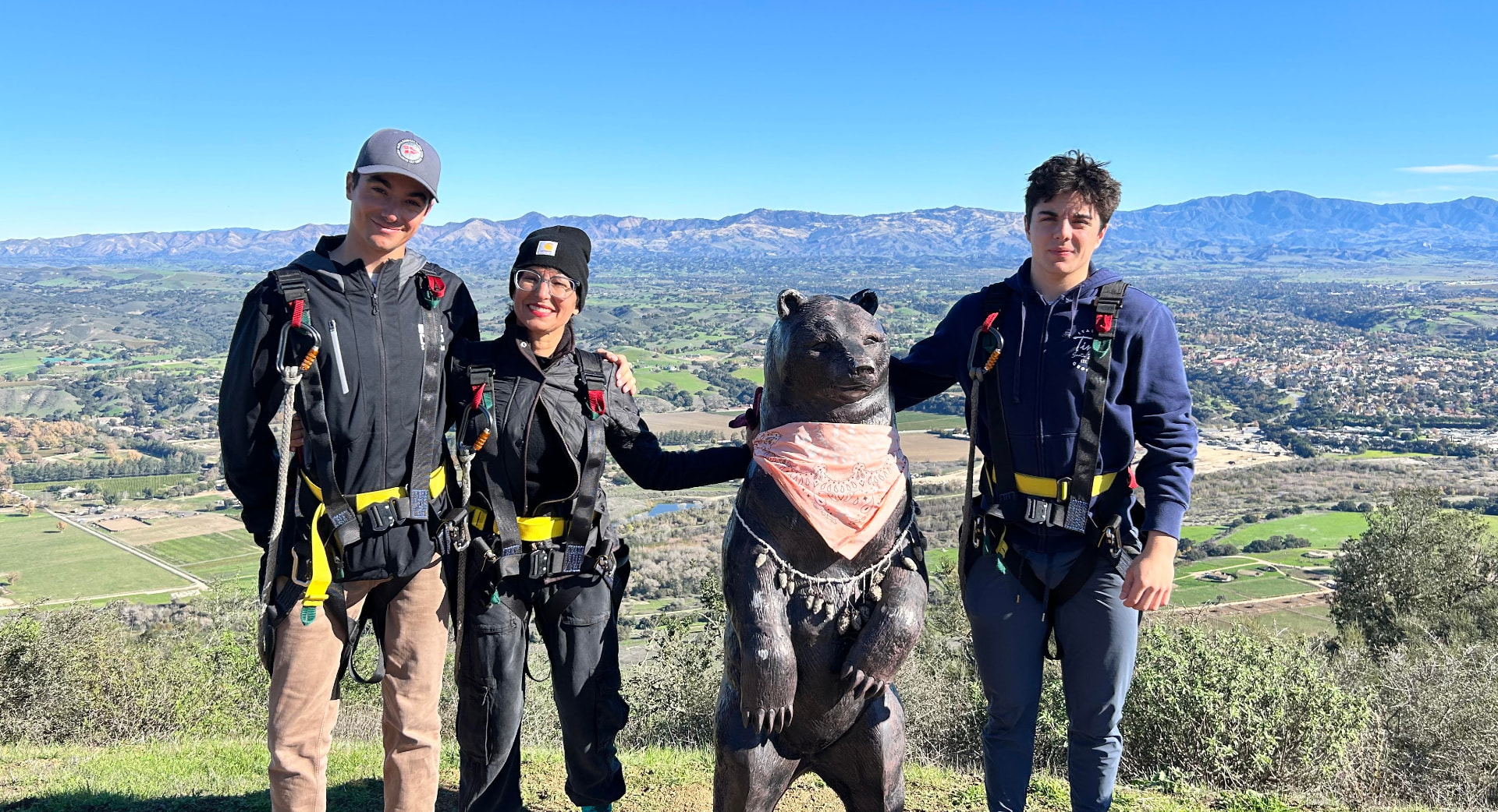 Elizabeth Orona and companions overlooking the valley from a Solvang-area hilltop