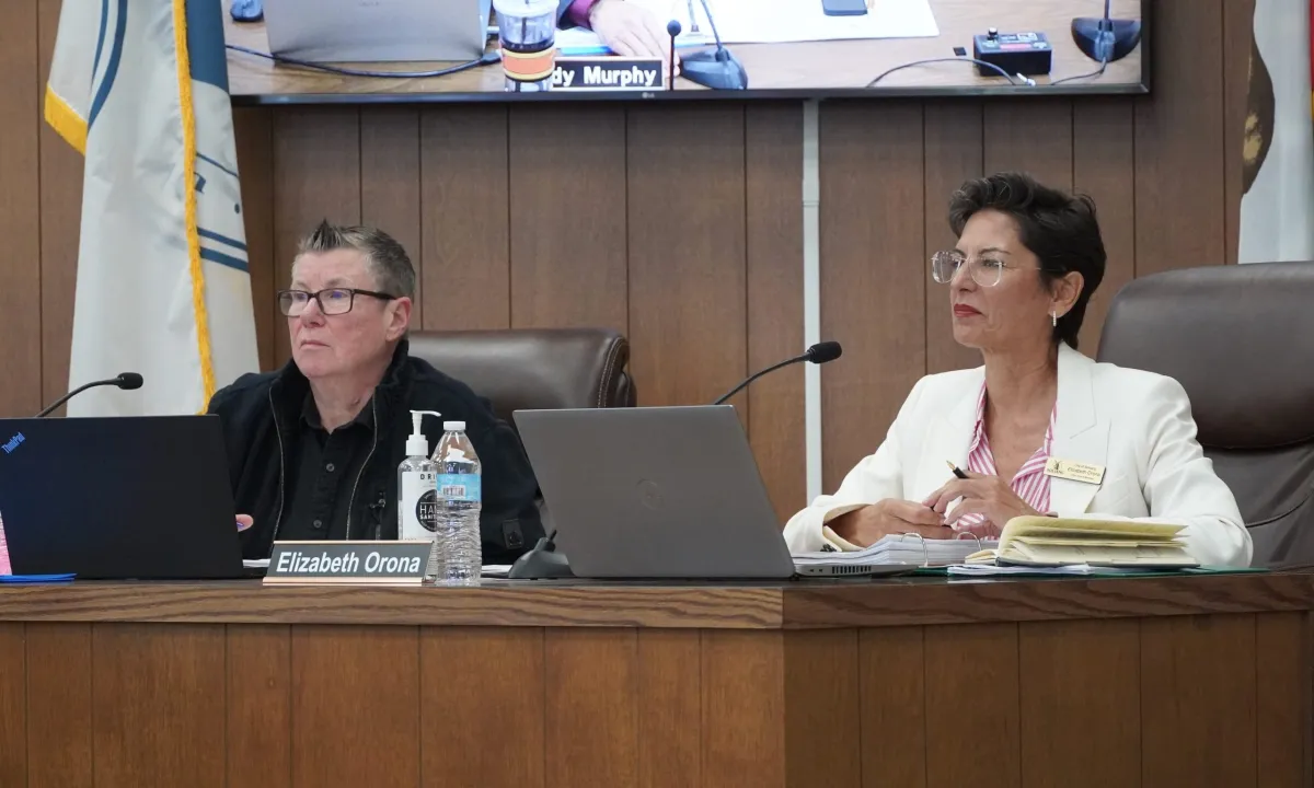Elizabeth Orona seated at the Solvang City Council dais beside her nameplate